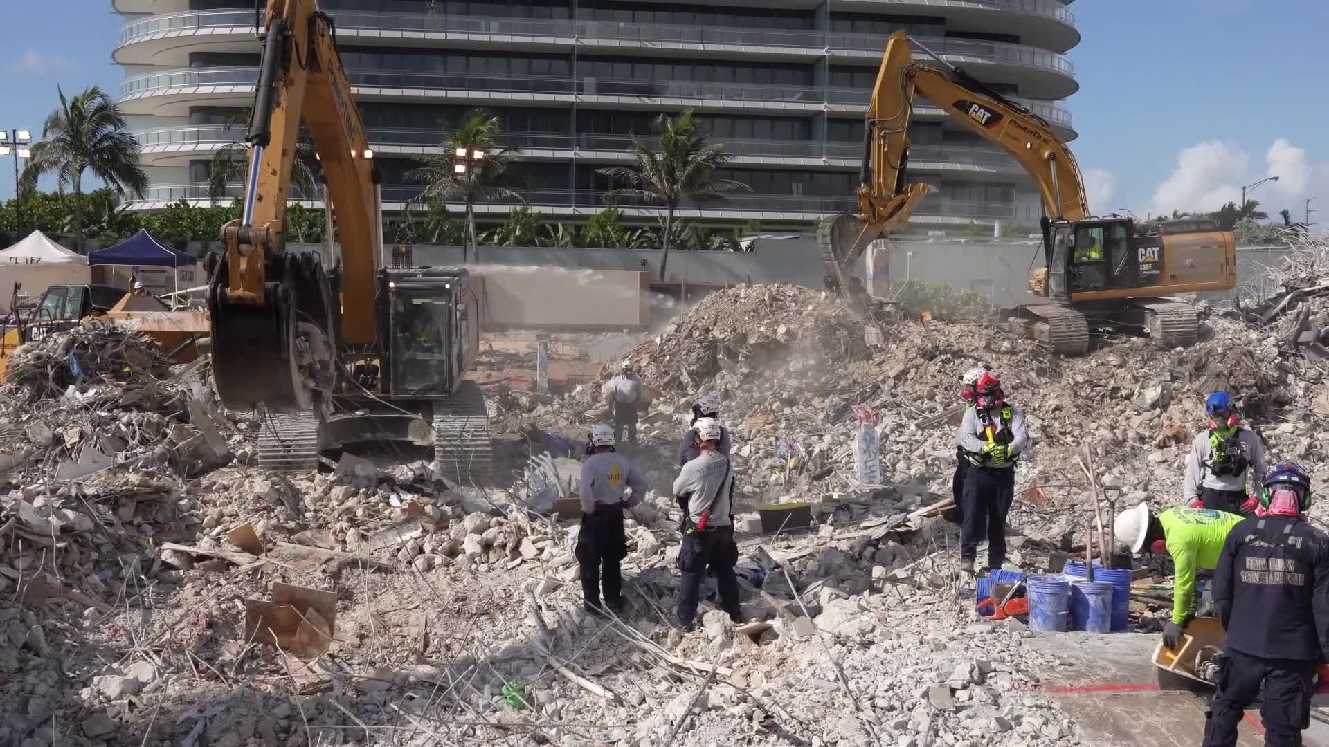 Search teams comb through rubble weeks after Surfside condo collapse