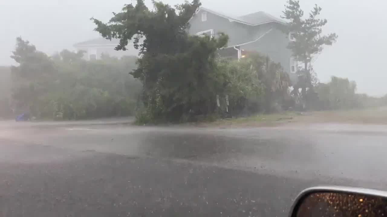 Tropical storm winds and heavy rain lash coastal South Carolina