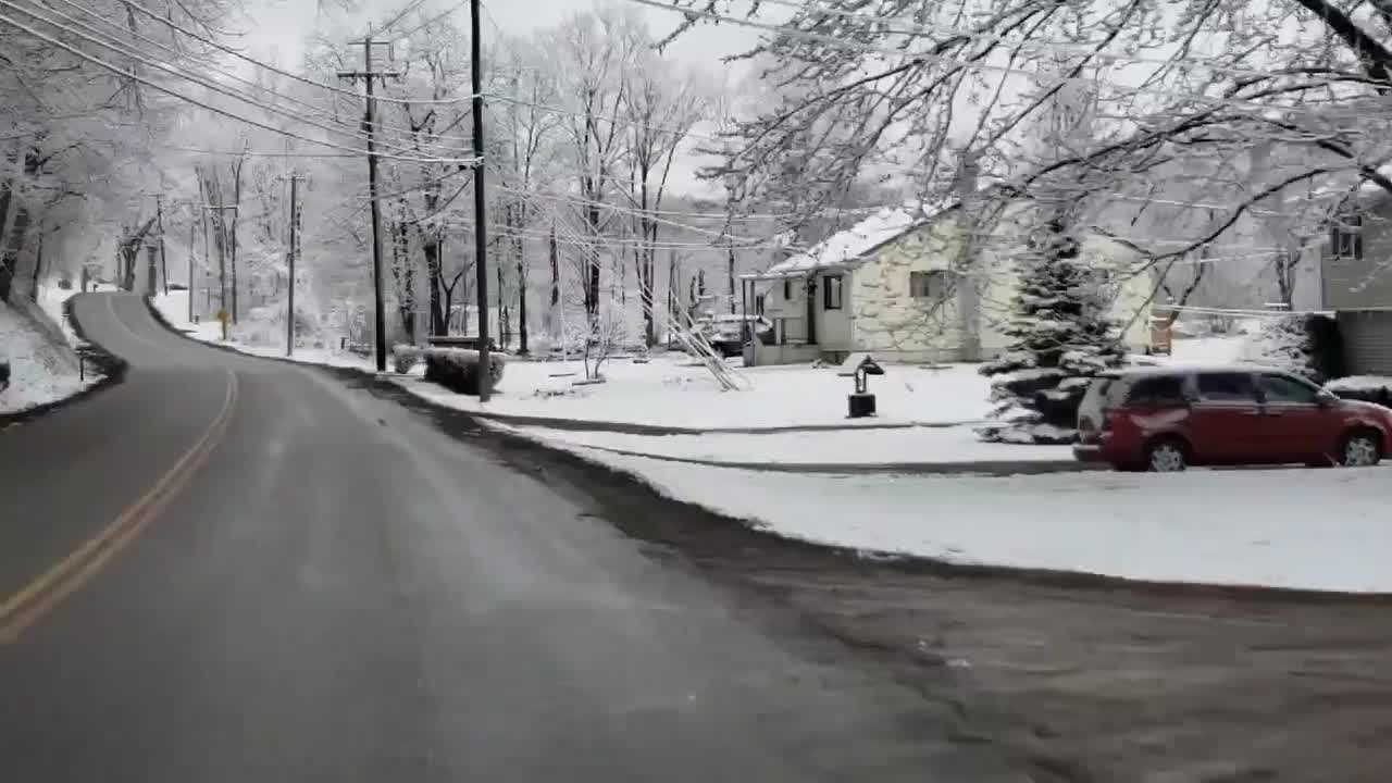 Snow falls on New York during April Fools Day cold snap
