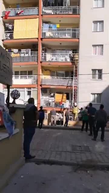 Firefighters rescue people from balconies after Turkish earthquake