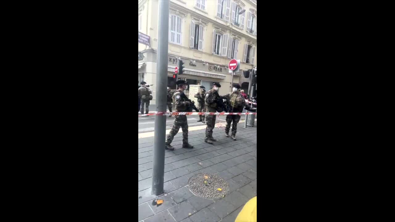 Armed personnel guard street after French knife attack
